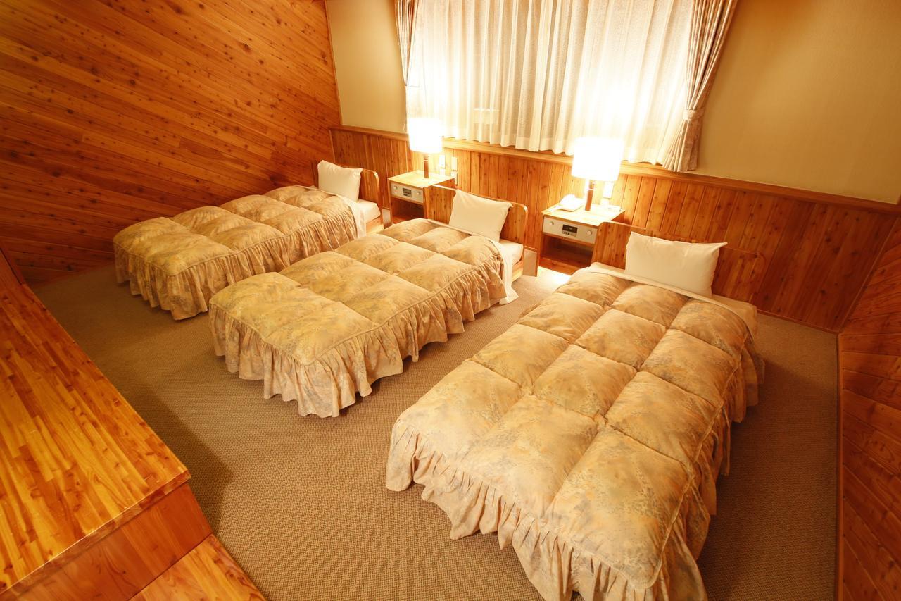 Log Hotel Larch Lake Kanayama Minamifurano Szoba fotó