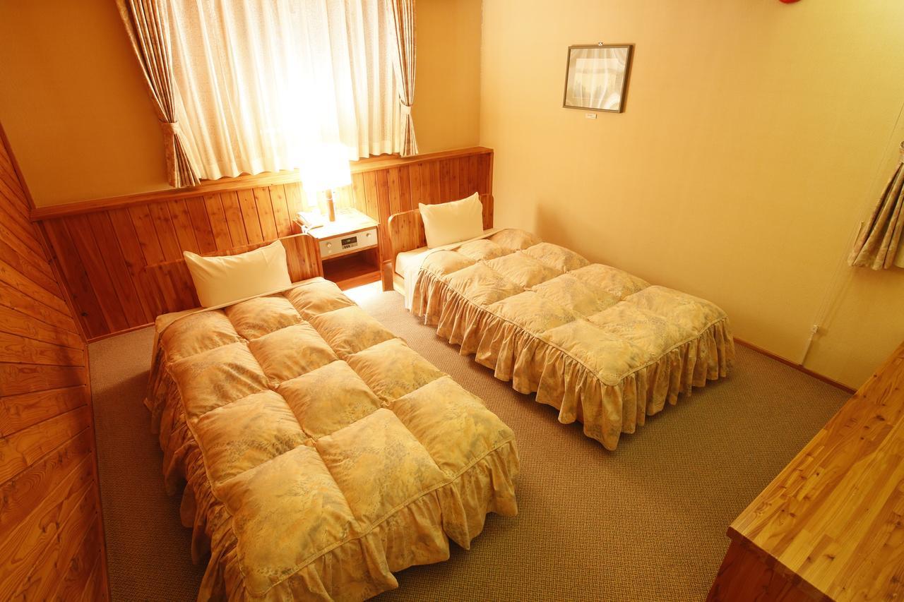 Log Hotel Larch Lake Kanayama Minamifurano Szoba fotó