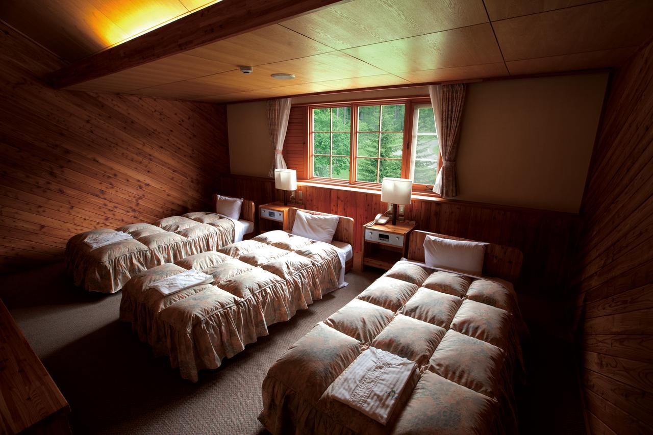Log Hotel Larch Lake Kanayama Minamifurano Szoba fotó