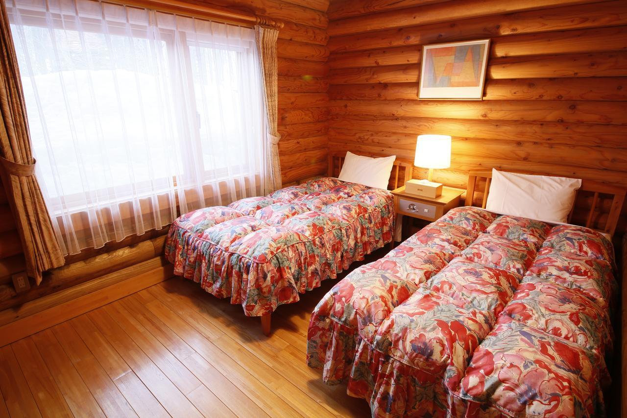 Log Hotel Larch Lake Kanayama Minamifurano Szoba fotó