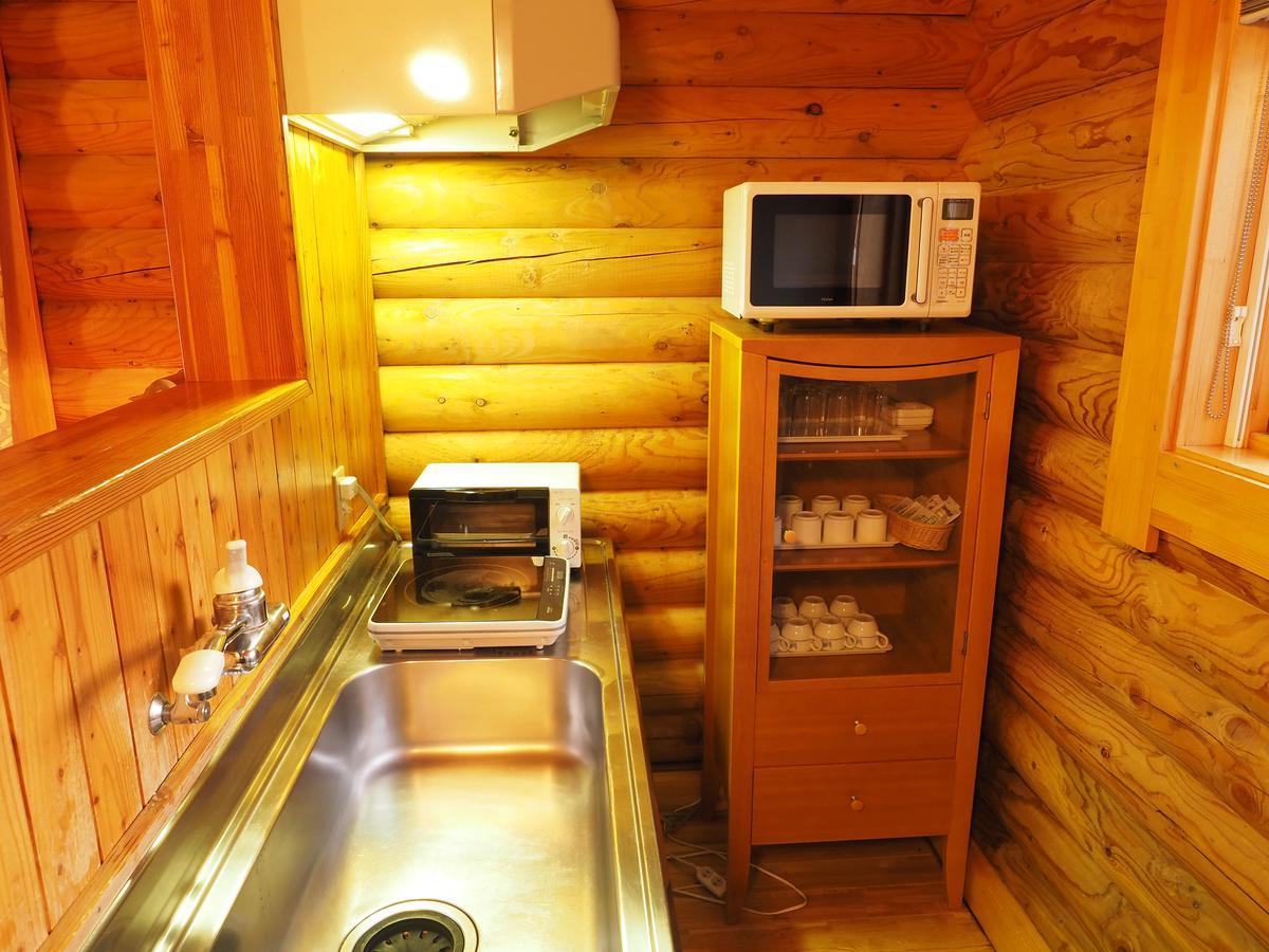Log Hotel Larch Lake Kanayama Minamifurano Szoba fotó