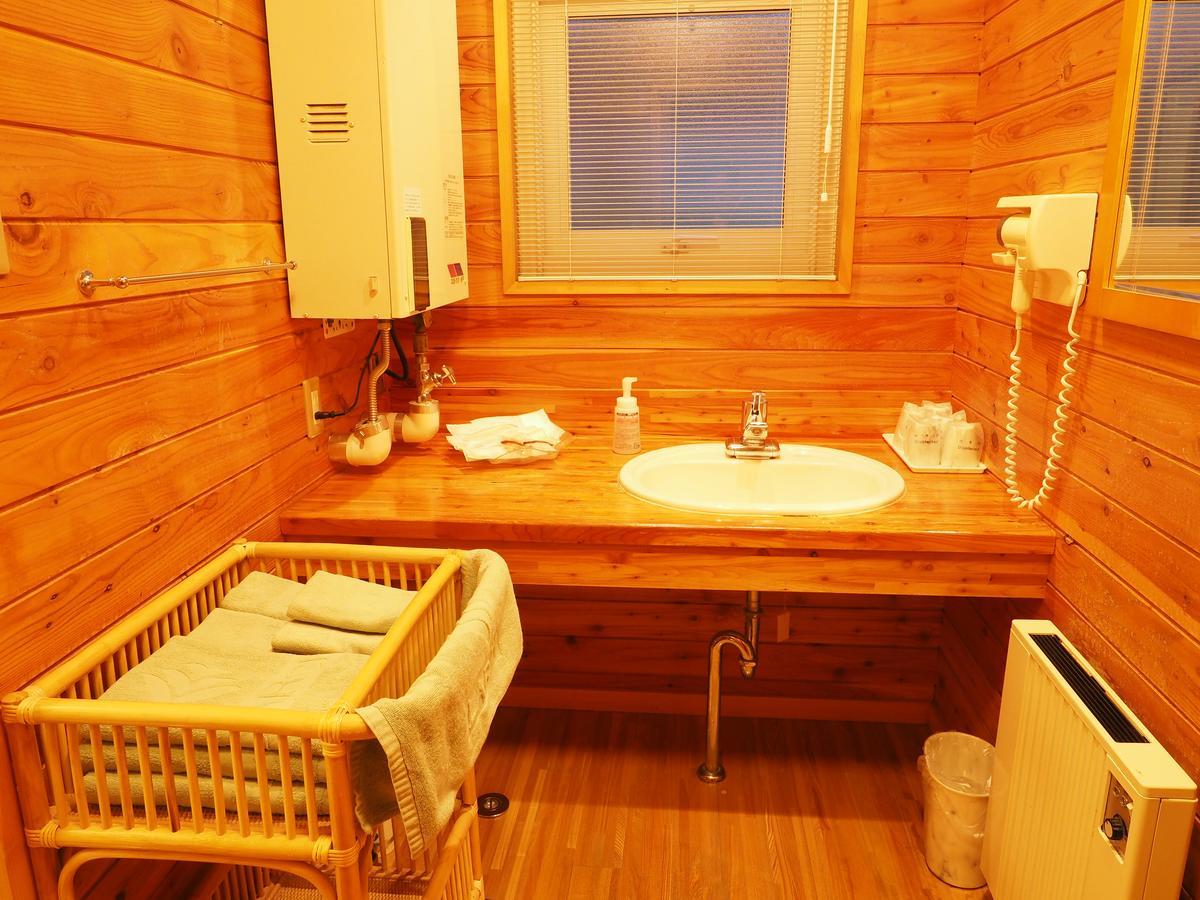 Log Hotel Larch Lake Kanayama Minamifurano Szoba fotó