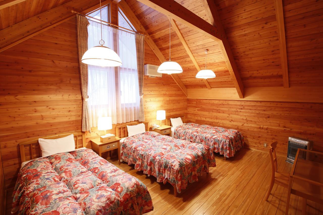 Log Hotel Larch Lake Kanayama Minamifurano Szoba fotó